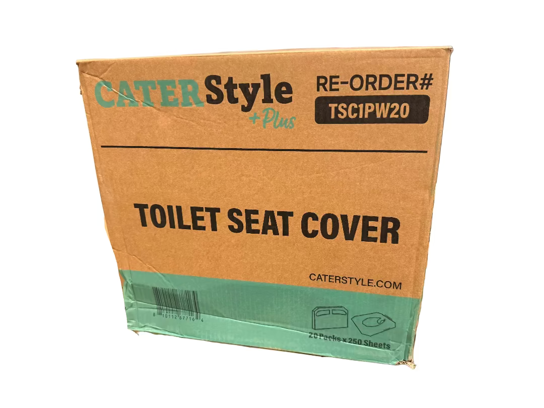 Cardboard box of CaterStyle toilet seat covers on a pallet